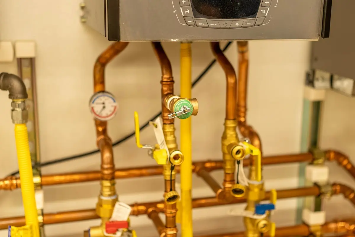 Licensed technician providing Backflow Prevention for a homeowner in Norwood